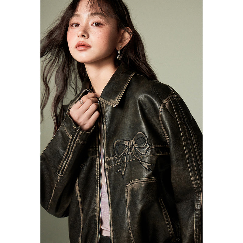 DIDDI MODA 褪せたようなヴィンテージ加工の黒と同色のリボンが大人っぽいのに甘くてクールな芯の強さを感じる女性にぴったりのジャケットとレザースカートのセットアップ。甘くてかっこいいリボンレザージャケット　ガールクラッシュな韓国風Y2Kスタイル　海外ガールはビンテージファッションや古着とミックスして個性的なスタイリングが完成します
